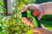 Thumb-control adjustable nozzle